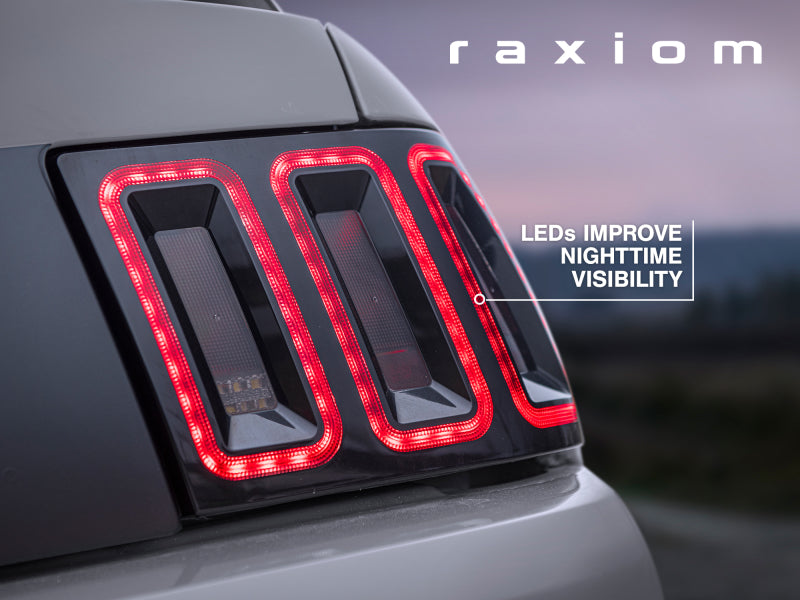 Raxiom 99-04 Ford Mustang Excluding 99-01 Cobra Icon LED Tail Lights- Black Housing (Smoked Lens)